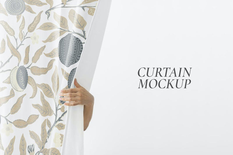 Hand opening a white curtain mockup